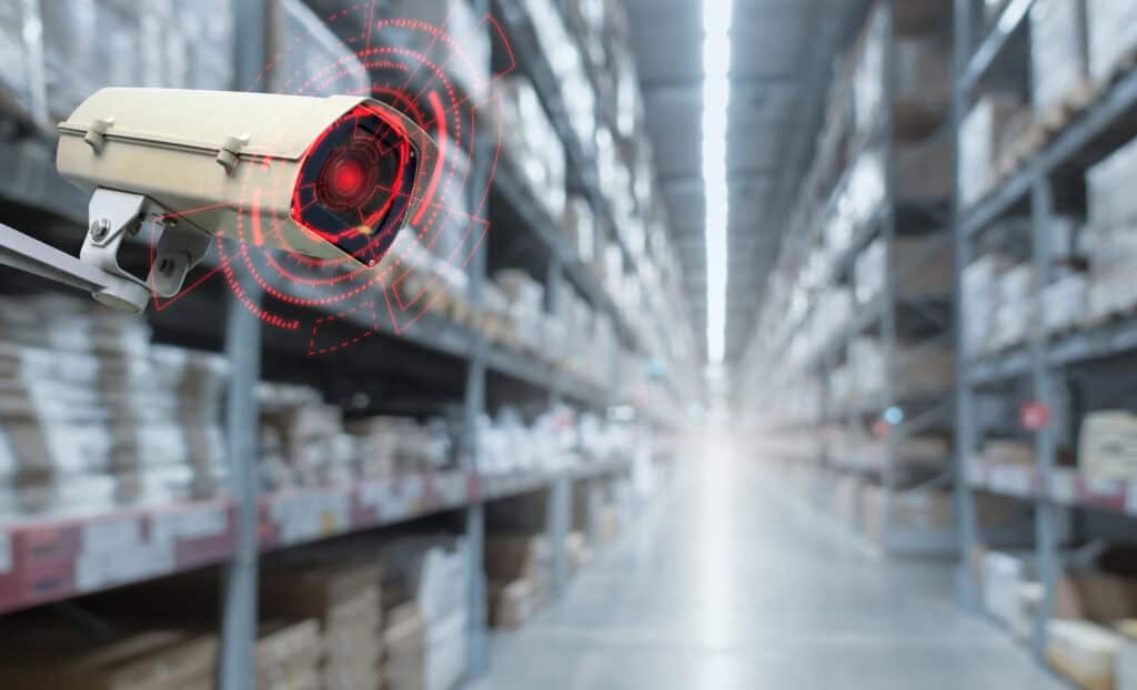 High-definition security camera with digital overlay, capturing warehouse security and network monitoring.