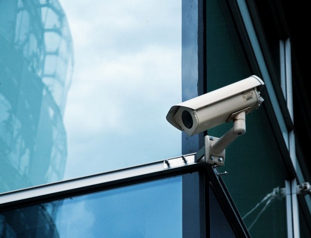 High-definition CCTV security camera for building surveillance and data protection.