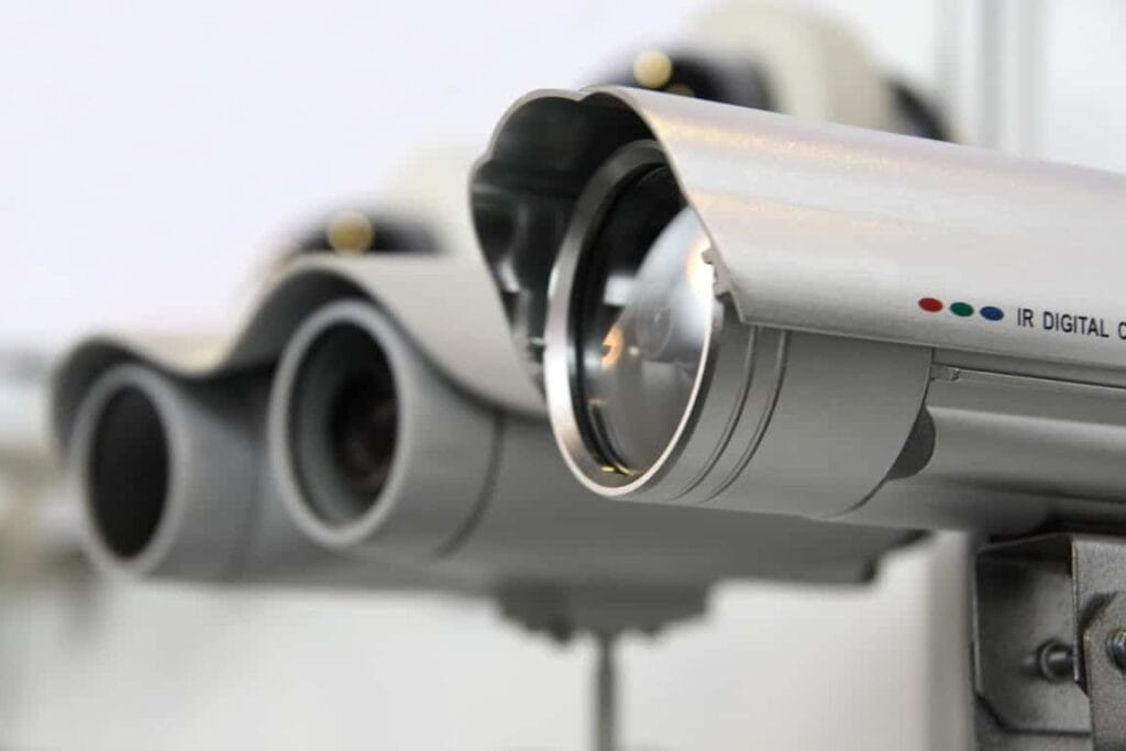 A close-up of a modern security camera used for surveillance and monitoring network data in secure environments.