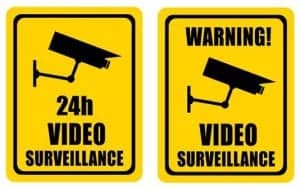 CCTV surveillance in operation sign