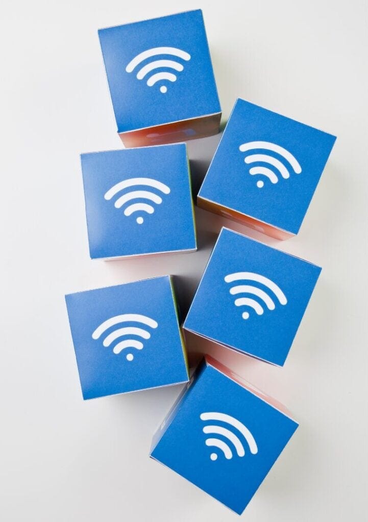 Network cables with Wi-Fi symbols representing wireless infrastructure