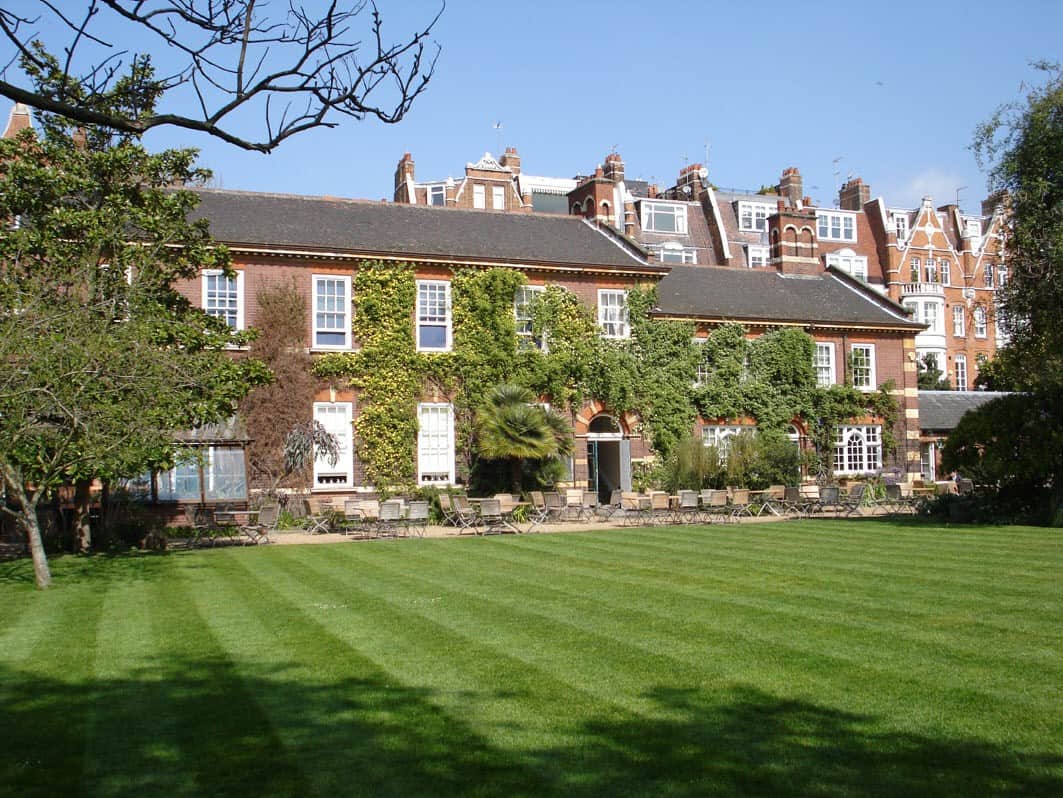 Historic building and lawn at Chelsea Physic Garden