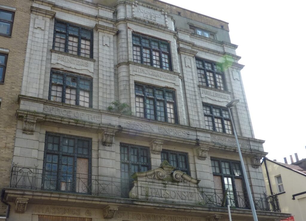 Historical building with network infrastructure elements visible outside.