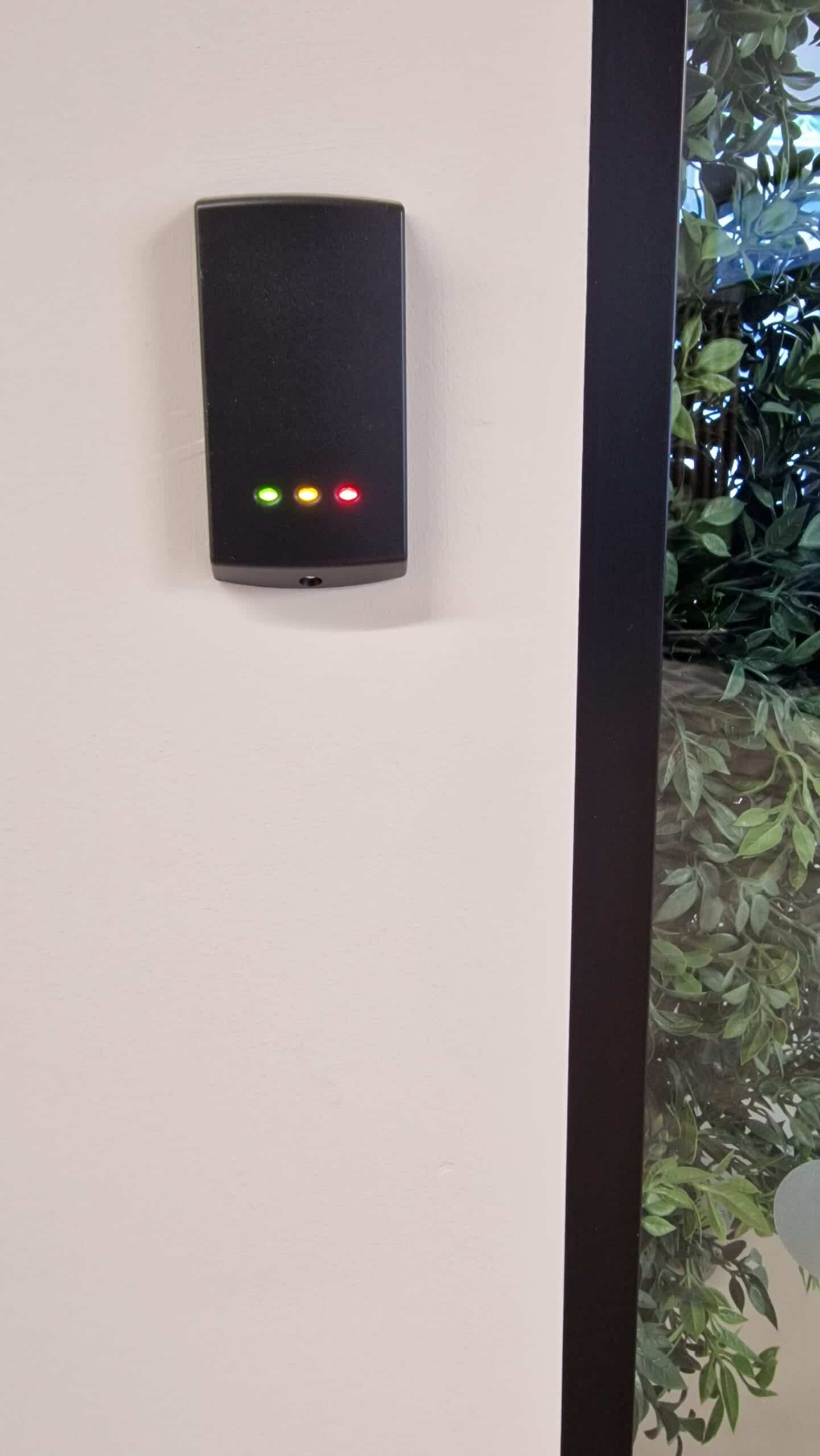 Paxton access control reader installed beside a controlled door at Babylon Health
