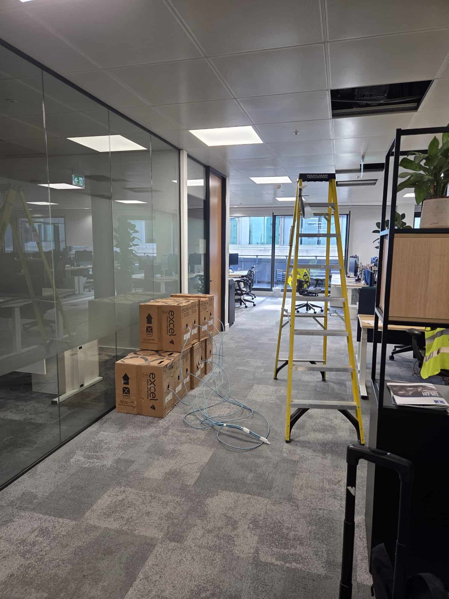 Reels of Excel Cat6A cable staged for installation at Gard's Level 5 office