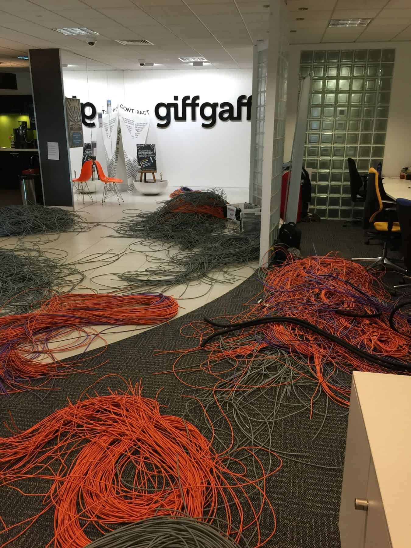 Redundant legacy network cabling removed from giffgaff's Uxbridge office during the recabling phase