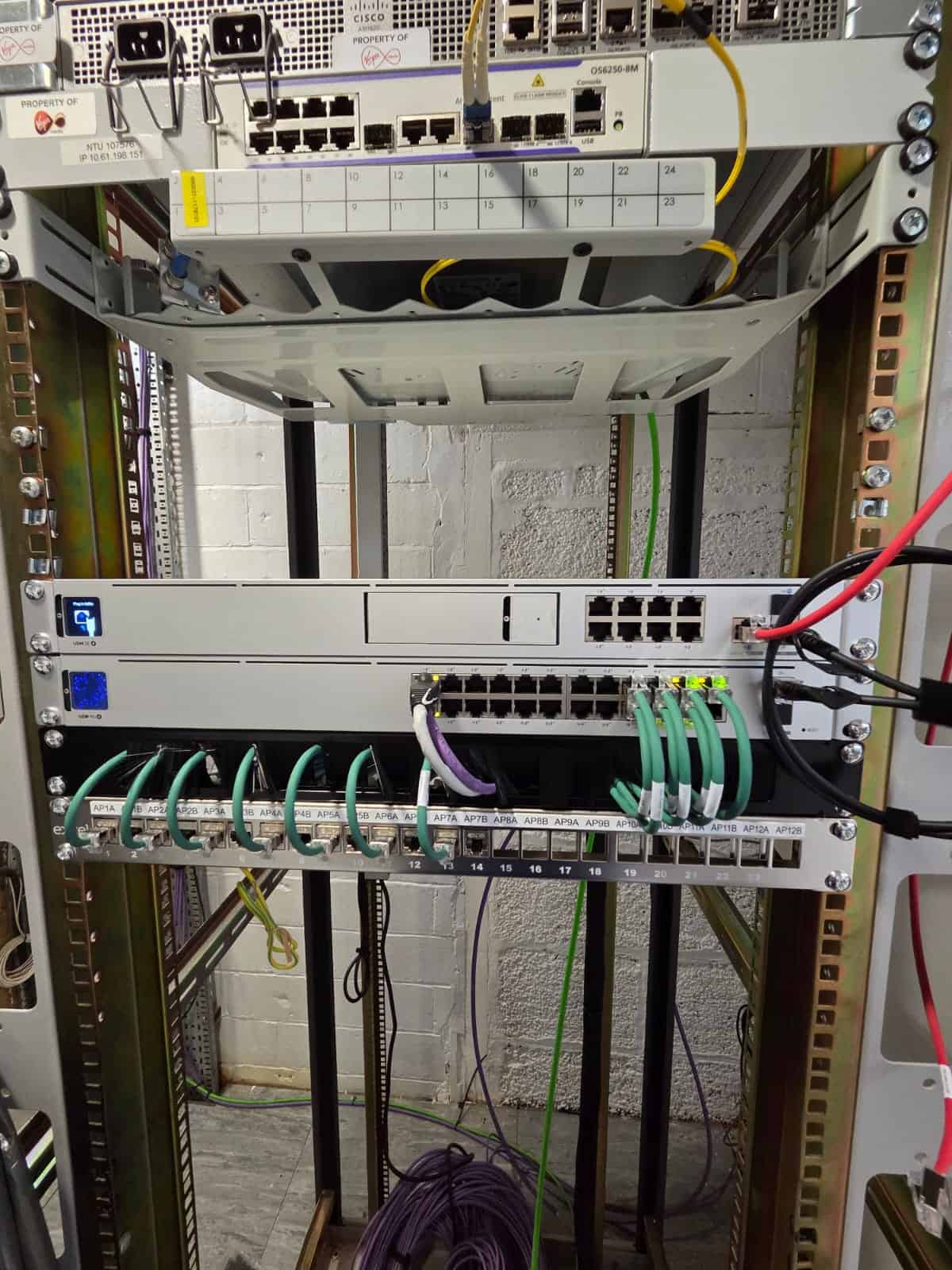 Ubiquiti Dream Machine SE, switch and access point patch panel built and labelled for Tidraw's office network