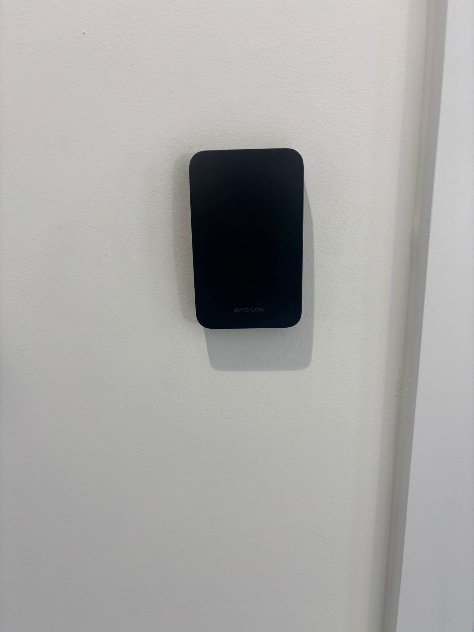 Avigilon access control reader mounted beside an internal door