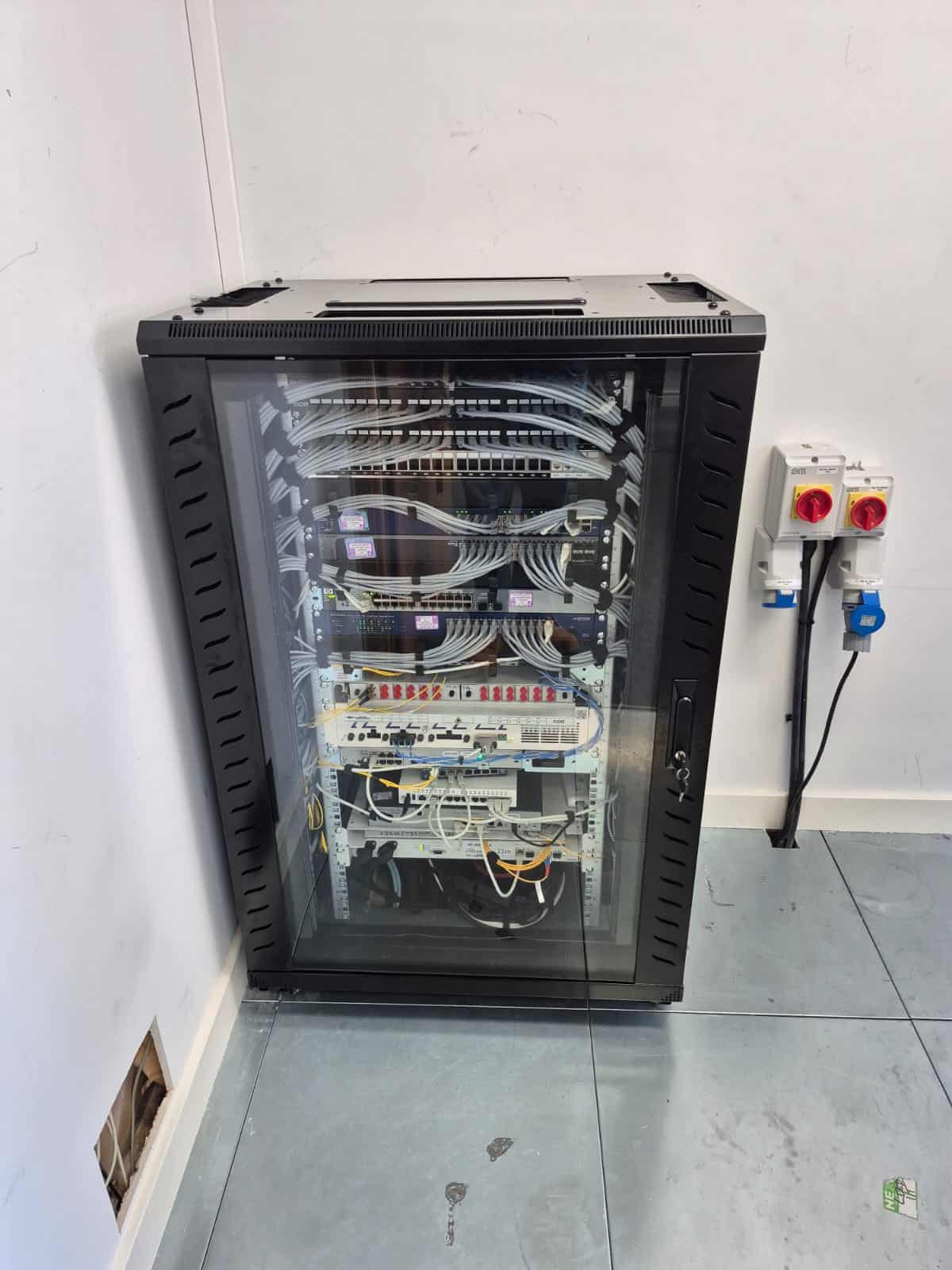 Completed and commissioned 24U communications cabinet at Zaiwalla & Co, Holborn