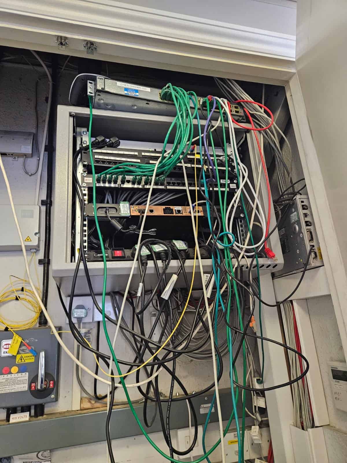 Legacy comms cabinet before ACCL's upgrade at Chestertons' Chiswick branch