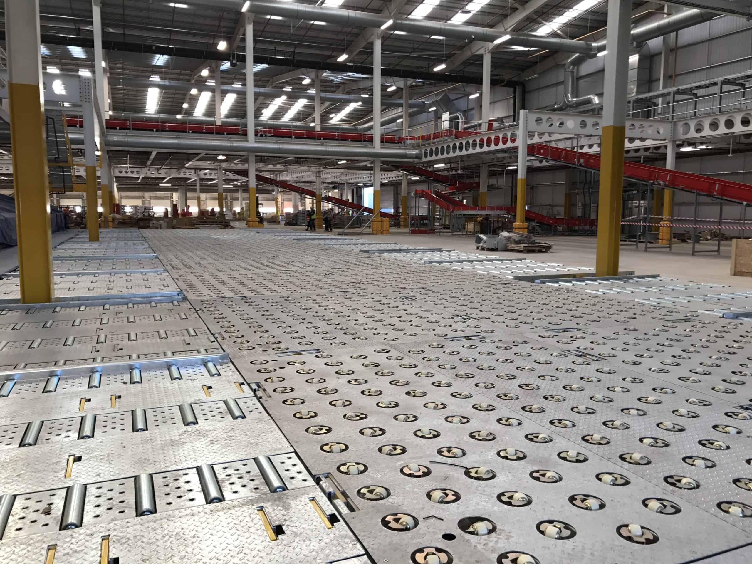 Parcel handling conveyor infrastructure at DHL’s East Midlands Airport distribution facility, supported by ACCL network cabling