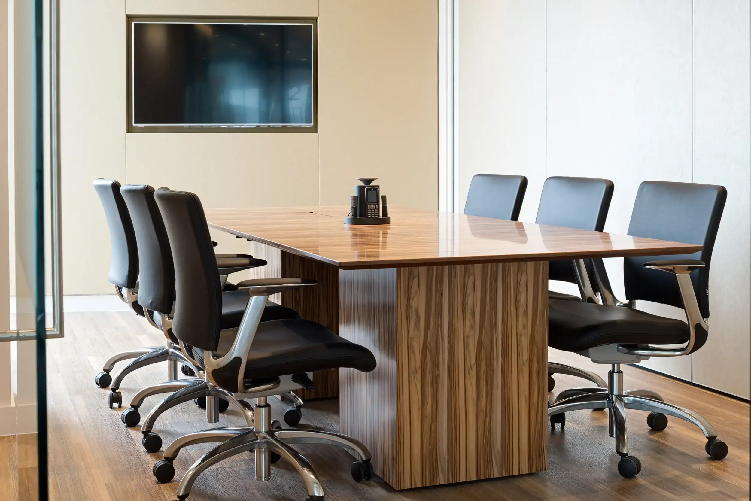 Foresight Group boardroom on Level 23 of The Shard, London, with conference phone and wall-mounted display