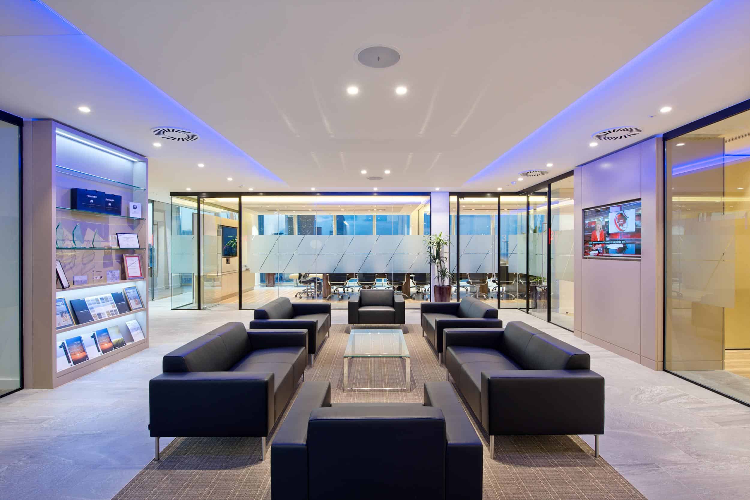 Foresight Group reception and lounge area on Level 23 of The Shard, London, with branded shelving and meeting room beyond