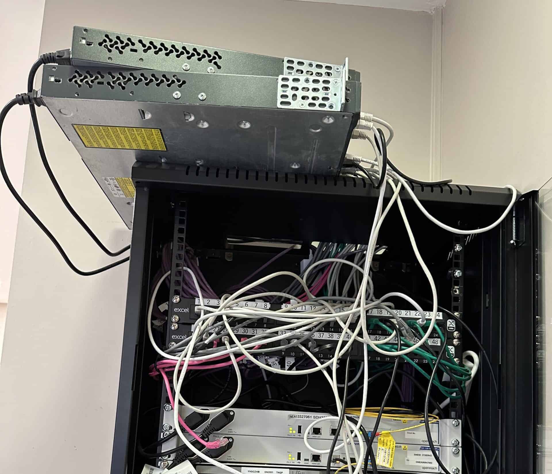 Legacy comms cabinet before ACCL's upgrade at Chestertons' Fulham Road branch
