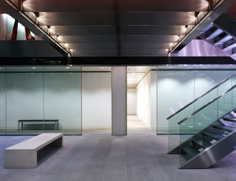 Contemporary office space with glass partitions and staircase at Grant Thornton, 30 Finsbury Square