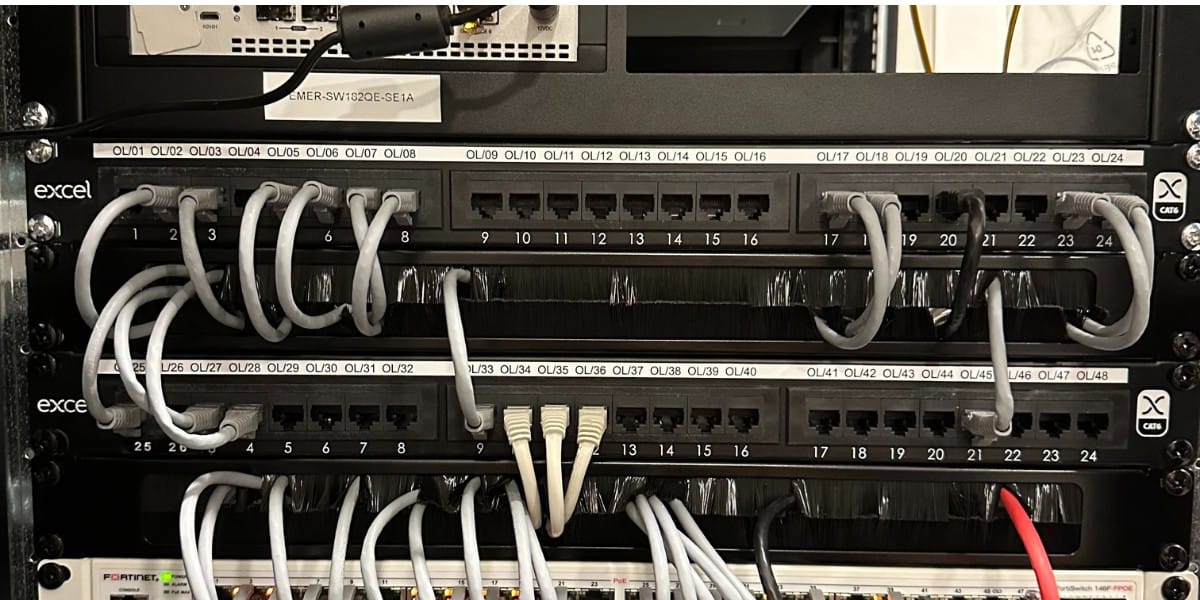 Structured cabling with network switches and patch panels at ACCL.
