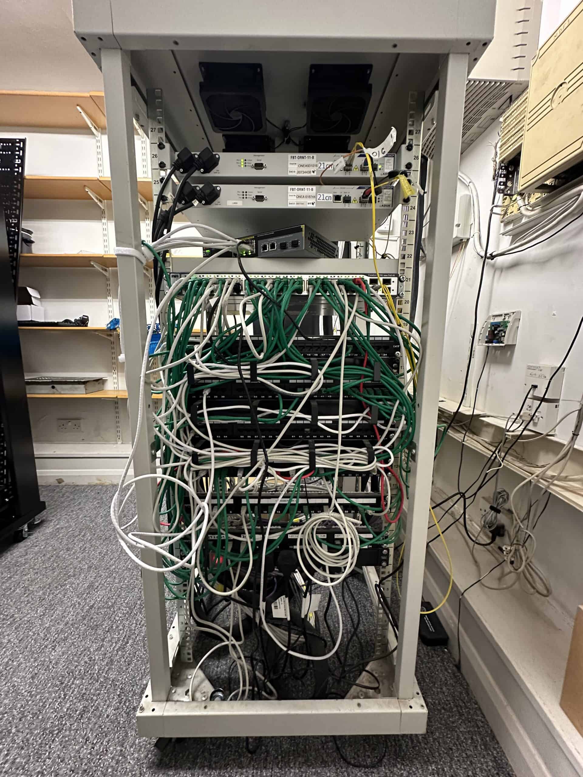 Legacy comms cabinet before ACCL's upgrade at Chestertons' South Kensington branch
