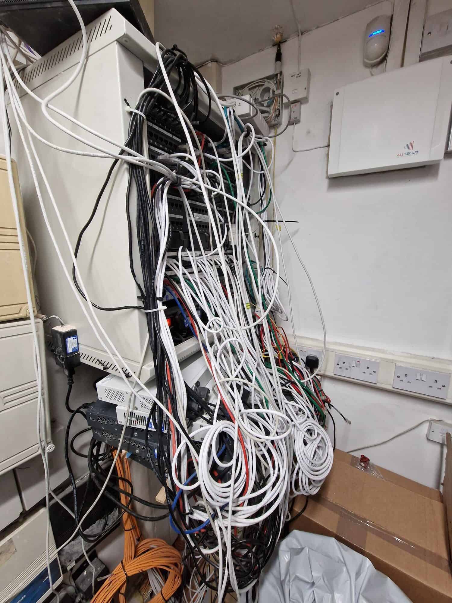 Legacy comms cabinet before ACCL's upgrade at Chestertons' Tower Bridge branch